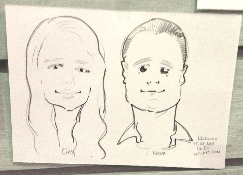 Черно-белый шарж Ольги и Евгения нарисованный маркером шаржистом Мишелем